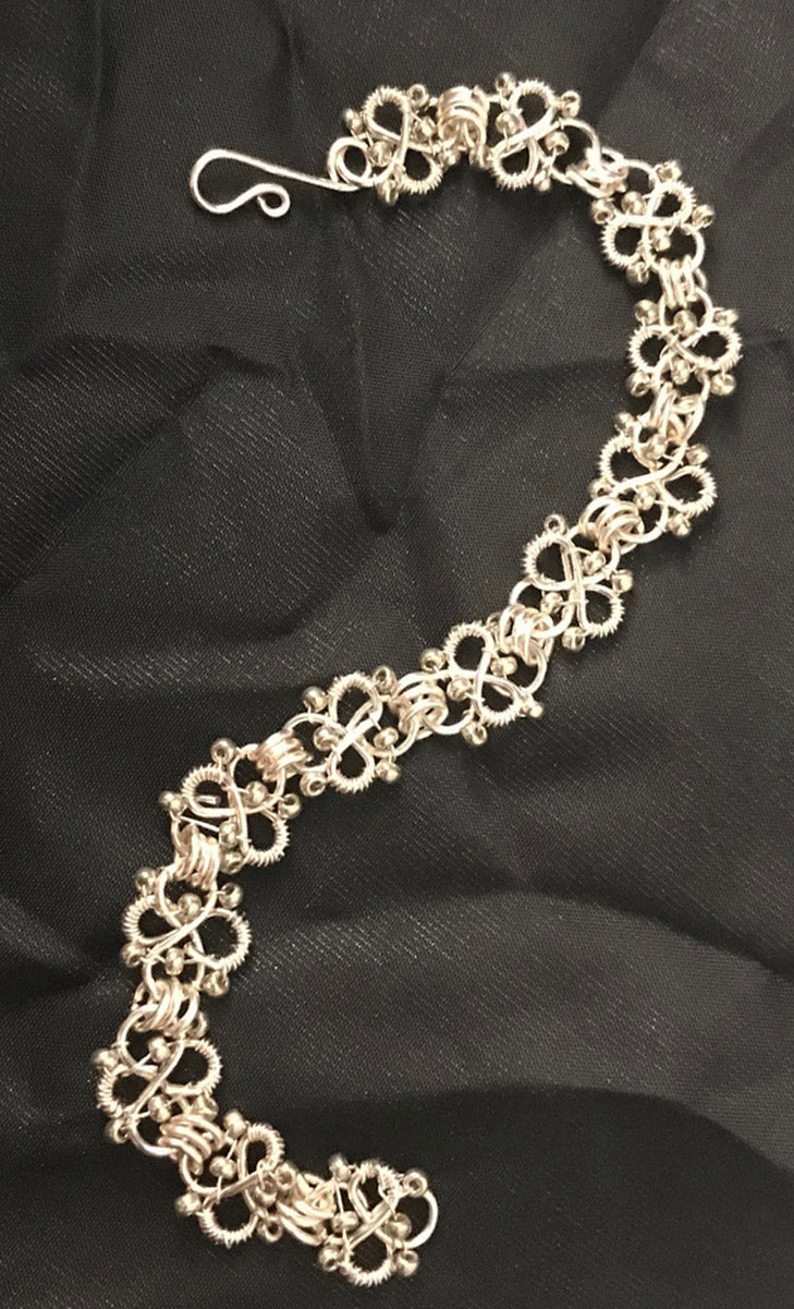 02-04-24 Bali-Style Silver Bracelet Various components with jump rings and links attached for a bracelet. Melody 1-4pm